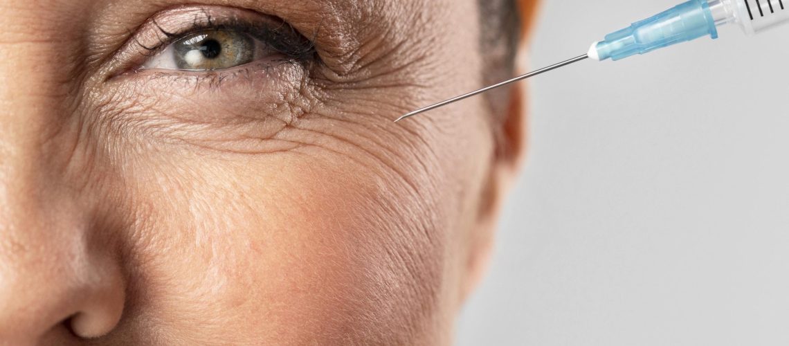 smiley-elder-woman-using-injection-her-eye-wrinkles